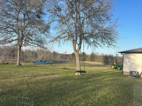 Relax & Recharge in Paige, TX - 15 Acres, Fishing, and Farm Animals Await