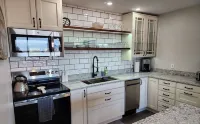 Escape to Spicer and enjoy stunning lake views from this comfortable 2-bedroom!