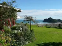 Bethells Beach Cottages