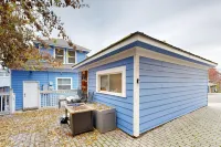 Relaxing river-view home with private patio, grill, covered balcony, & W/D