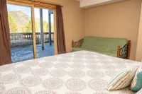 Charming Condo with Scenic Deck and Fireplace - Cozy Mountain Retreat