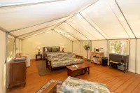 Scenic Grounds with Cozy Cabins and Stocked Pond - Charming Escape