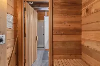 Spacious Deck and Sauna with Partial Lake View - Charming Retreat