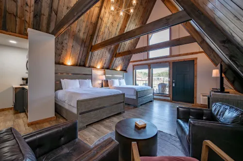 Electric Fireplace and Outdoor Pool Views - Spacious Inviting Hotels in Terra Alta