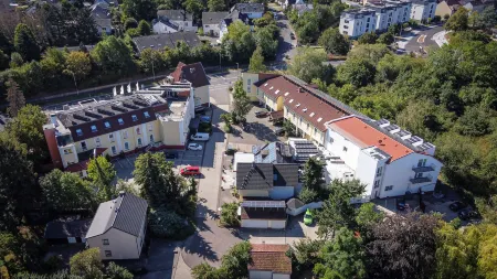 City Hotel Meckenheim Отели в г. Райнбах