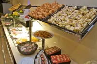 Holiday Inn Express CAMPO DE GIBRALTAR - BARRIOS by IHG - servizio colazione