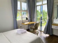 Calm Beach Inn Hotels in Gan