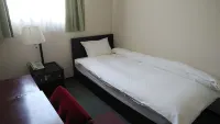Business Hotel Kei فنادق في واكاياما