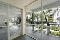 Coastal Escape • Walk to Beach • Gym •  Pool • Hot Tub