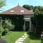 charming cottage at the foot of a 13th century abbey