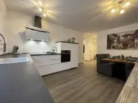 Modern and centrally located holiday apartment with a large balcony. Hotels in Losheim