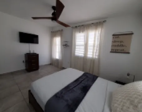 Aguadilla Sunset Apt with electricity water AC WIFI 8 minute walk from Crashboat