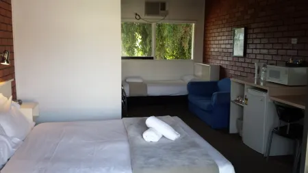 Boat Ramp Motel Отели в г. Уоллингтон