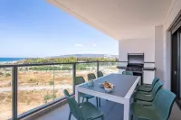 Stylish Seaside Escape with Balcony