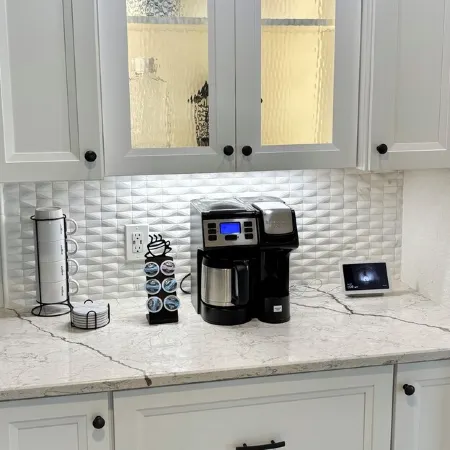 SENSATIONAL!! WATER-VIEW, LUXURY REMODEL, SUNNY HEATED POOL, HUGE 145’ SEA WALL