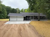 Year-round 3BR/2BA trailside house & 4 electric campsites near Lake Missaukee