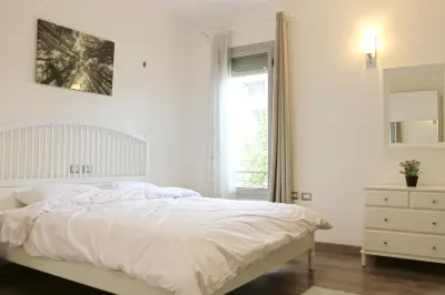 Luxurious 1BR Apartment in Palm Gate New Cairo Near AUC Hotels in El Matareya