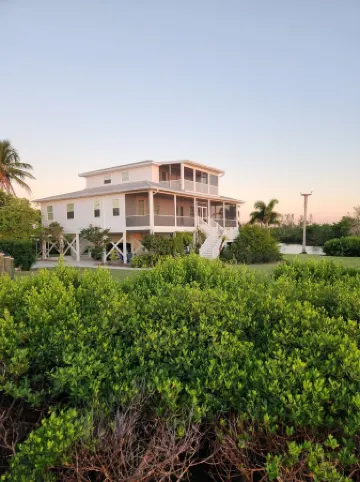 Large home on private penninsula with waterfront and views on three sides.