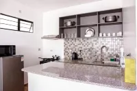 Cozy 2-BR Aprt with Pool, Gym at Tatu City 키암부 호텔