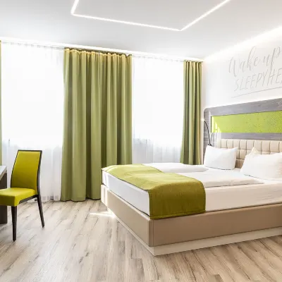 Chrizz Rooms Отели рядом с достопримечательностью «Центральный вокзал Граца»