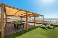 Sunny Rooftop Poolside Panoramic View