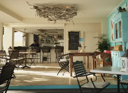 Ocean Breeze Boutique Hotel & Marina Отели в г. Кралендейк