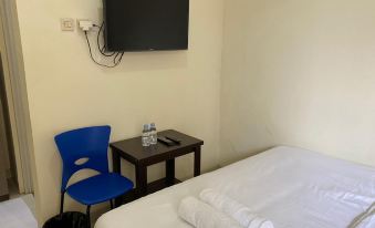 Jatiwinangun Homestay Near Gor Satria Purwoketo Mitra RedDoorz