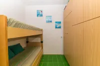 Il Vecchio Faro A48 from the Beach - Happy Rentals