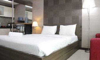 Prime and Comfy Studio at Tamansari la Grande Apartment by Travelio