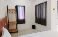 Her Mandiri Guest House Hotels in Балікпапан
