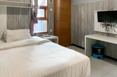 Karins Guesthouse Syariah RedPartner Hôtels à : Rancasari