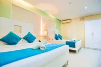 Holiday Suites Business District (Empire Suites Hotel)
