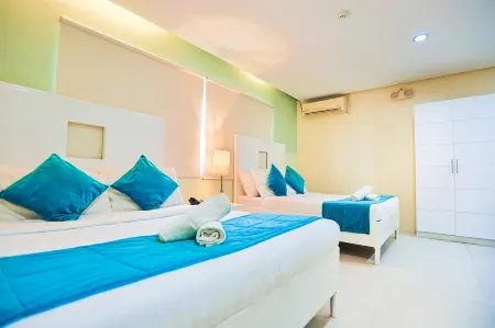 Holiday Suites Business District (Empire Suites Hotel)