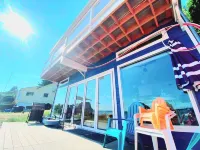 Waterfront beach house 3 minute walk to town.