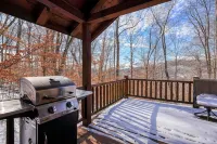 Bear Hugs cabin nestled in the woods.