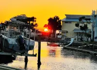 Unique waterfront home, Hot Tub, private boat dock,  walk to beach, pet friendly