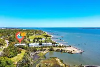 No Cleaning Fee! Brand New Double Queen Studio Condo w/ Waterfront Pool + Beach