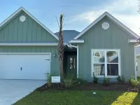 Enjoy sunset and an evening around firepit, short walk to beach and pool