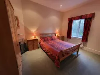 Victorian stone mansion in extensive grounds overlooking Bala Lake