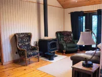 Charming 2-bedroom cottage with loft, AC, and WiFi on peaceful 295-acre property Hotels in Conway County