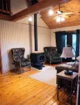 Charming 2-bedroom cottage with loft, AC, and WiFi on peaceful 295-acre property