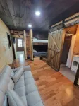 Tiny house on the lake With a seventy five inch t v free internet  walk shower