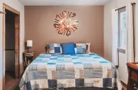 Little Blue Cottage - wooded getaway, near beaches and towns