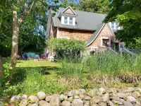 The Boathouse on Waukazoo!  Beach, Bars, Brewery all within a block!