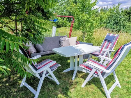Cozy log cabin by the forest with large garden