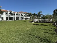 End unit with extra windows. Steps to the beach, private beach access!