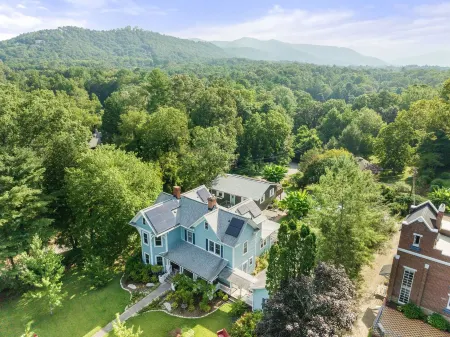 Stunning Restored Victorian on a  Picturesque Lot with Flower Garden & Fountain