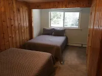 Atv-Snowmobile Trail, sits on the Laughing Whitefish River, sleeps 16 people.