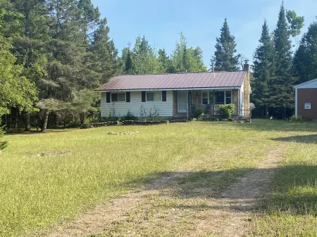 The Cozy House on Neebish Island   Surrounded by the St. Mary’s River