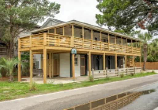 Classic Pawleys. Just Renovated. Long, breezy porches. Steps to beach and creek.